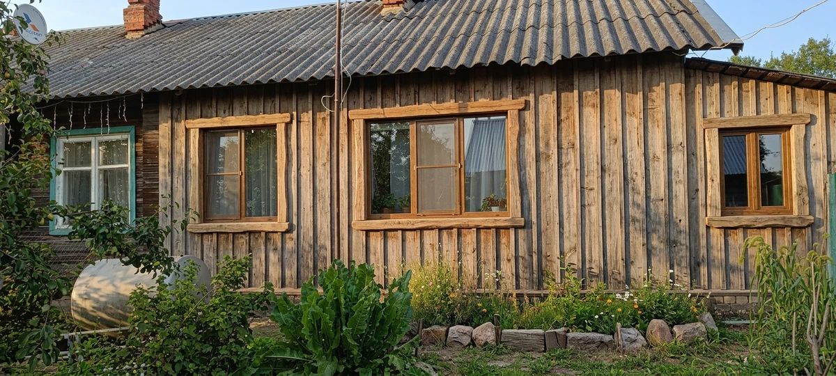 Дизайн фасада в стиле Деревенский — фото от нейросети AI Facade